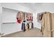 Walk-in closet with ample storage and organization at 10749 E Nido Ave, Mesa, AZ 85209