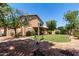 Expansive backyard with lush lawn and patio, perfect for outdoor entertaining and relaxation at 3713 E Encinas Ave, Gilbert, AZ 85234