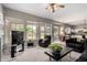 Comfortable living room featuring a large window with a backyard view at 3713 E Encinas Ave, Gilbert, AZ 85234