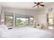 Large main bedroom with vaulted ceilings and a seating area at 3713 E Encinas Ave, Gilbert, AZ 85234
