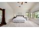 Bright main bedroom with natural light, large windows, and neutral décor at 3713 E Encinas Ave, Gilbert, AZ 85234