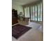 Cozy sitting area featuring large windows and a decorative rug at 5322 N 78Th St, Scottsdale, AZ 85250