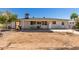 Backyard with covered patio and BBQ setup ready for outdoor dining at 5410 E Duncan St, Mesa, AZ 85205