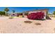 Charming single-story home featuring desert landscaping, a vibrant bougainvillea, and a clear blue sky at 5410 E Duncan St, Mesa, AZ 85205