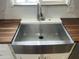 A stainless steel farmhouse kitchen sink at 5410 E Duncan St, Mesa, AZ 85205