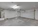 This spacious garage features a water heater and ample room for parking and storage at 129 S 198Th Dr, Buckeye, AZ 85326