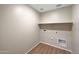 Neutral laundry room with lots of space and connections for a washer and dryer at 129 S 198Th Dr, Buckeye, AZ 85326