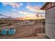Exterior view showcases the structure in progress, set against a desert landscape at 3835 W Fox Rd, Laveen, AZ 85339
