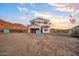 New construction exterior featuring a two-story home, showcasing the framing stage at 3835 W Fox Rd, Laveen, AZ 85339