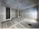 Spacious bedroom under construction, with multiple doorways and a drywall finish at 4309 E Brook Lynn Pl, San Tan Valley, AZ 85143