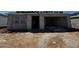 Exterior image of a new home under construction showcasing the front and garage with exposed framing at 4309 E Brook Lynn Pl, San Tan Valley, AZ 85143