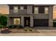 Beautiful two-story home with modern design, manicured landscaping, and a two-car garage at 4746 S Orbit St, Mesa, AZ 85212