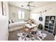 Cozy bedroom with a daybed, decorative accessories, and a geometric patterned rug at 1237 E Marcella Ln, Gilbert, AZ 85295