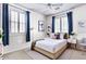 Serene bedroom with ample natural light, stylish window shutters, and contemporary decor at 1237 E Marcella Ln, Gilbert, AZ 85295