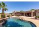 Private backyard pool and patio area with outdoor kitchen, pergola, mature landscaping, and inviting desert ambiance at 19515 E Via Del Palo --, Queen Creek, AZ 85142