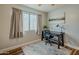 Office with modern desk and chair, lots of natural light and hard surface floors at 4010 W Mariposa Grande --, Glendale, AZ 85310