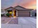 Charming single-story home with a well-manicured front yard and a spacious two-car garage at 18217 E El Viejo Desierto --, Gold Canyon, AZ 85118