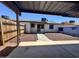 A pleasant backyard featuring a wood fence and a nice walkway to the house at 5120 W Willow Ave, Glendale, AZ 85304