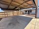 The home has a backyard with a covered parking area and a wood fence at 5120 W Willow Ave, Glendale, AZ 85304
