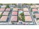 Aerial view showcases the community layout, pool, playground, streets, and cohesive architectural design at 7533 S 31St Pl, Phoenix, AZ 85042