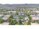 Aerial view of community showing nearby park and pool, surrounded by well-maintained neighborhood streets at 7533 S 31St Pl, Phoenix, AZ 85042