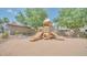 Well-maintained neighborhood playground with multiple slides, climbing structure, shade, and play area at 7533 S 31St Pl, Phoenix, AZ 85042