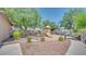 Neighborhood playground featuring slide, play structure, benches, mature trees, and well maintained landscaping at 7533 S 31St Pl, Phoenix, AZ 85042