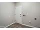 The mud room offers tile floors, access to the backyard, and connections for a washer and dryer at 10551 W Jessie Ln, Peoria, AZ 85383