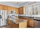 Kitchen with granite countertops, stainless appliances and wood cabinets at 10603 E Firewheel Dr, Scottsdale, AZ 85255