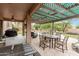 Backyard featuring a covered patio and in ground pool at 10653 E Lindner Cir, Mesa, AZ 85209