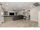 Spacious living room features built-in shelving and a cozy, neutral color palette at 10653 E Lindner Cir, Mesa, AZ 85209