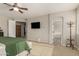 Comfortable main bedroom with an ensuite bathroom featuring a large tub at 10653 E Lindner Cir, Mesa, AZ 85209