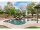 Backyard swimming pool with mature landscaping providing a serene atmosphere at 10653 E Lindner Cir, Mesa, AZ 85209