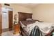 Bedroom featuring a bed, nightstand, and a door leading to another room at 1143 E 7Th St, Mesa, AZ 85203