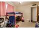 Bedroom featuring a bunk bed, ceiling fan, and a window allowing natural light at 1143 E 7Th St, Mesa, AZ 85203