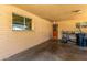 Covered carport with convenient access to the home's exterior entrance, complete with workspace at 1143 E 7Th St, Mesa, AZ 85203