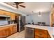 Kitchen featuring wood cabinets, and stainless steel appliances at 1143 E 7Th St, Mesa, AZ 85203