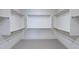 Spacious walk-in closet with rods and shelves for organized storage at 11996 N Luckenbach St, Surprise, AZ 85388