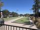 Bocce ball courts with seating areas and lush desert landscaping at 1303 W Cherrywood Dr, Queen Creek, AZ 85140