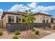 Beautiful single story home featuring low maintenance landscaping, brick paver walkway and neutral color palette at 1303 W Cherrywood Dr, Queen Creek, AZ 85140