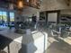 Inside the lounge area, featuring modern decor, a fireplace and lots of seating at 1303 W Cherrywood Dr, Queen Creek, AZ 85140