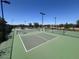 Well-maintained pickleball courts with professional netting and court lines at 1303 W Cherrywood Dr, Queen Creek, AZ 85140