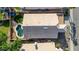 This home features a private backyard pool, patio, and lush landscaping as seen from above in the community at 1447 E Nighthawk Way, Phoenix, AZ 85048