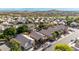 Real estate showcasing a vibrant neighborhood with lush landscaping, community parks, and mountain views at 1447 E Nighthawk Way, Phoenix, AZ 85048
