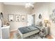 Charming bedroom with colorful decor, wood floors and closet at 1447 E Nighthawk Way, Phoenix, AZ 85048