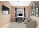 Bedroom setup with neutral tones and a dedicated work area for a clean and functional space at 1447 E Nighthawk Way, Phoenix, AZ 85048