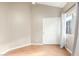 Bedroom with wood floors, closet, and neutral walls at 1447 E Nighthawk Way, Phoenix, AZ 85048