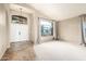 Bright open-concept living room featuring an arched entry, updated flooring, and a welcoming ambiance at 1447 E Nighthawk Way, Phoenix, AZ 85048