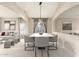Open living space showcasing seamless flow between living room and dining area, ideal for entertaining at 1447 E Nighthawk Way, Phoenix, AZ 85048