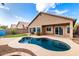 Inviting pool area with clear blue water and beautiful landscaping, perfect for relaxation at 1447 E Nighthawk Way, Phoenix, AZ 85048